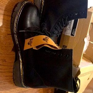 Brand new Dr. Martens, Size 41. My daughters foot grew before she wore them.